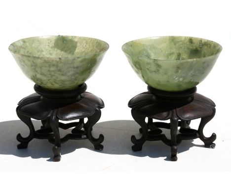 A pair of jade or hardstone cups on stands in original box, 10cms (4ins) diameter.Condition Reportgood overall condition
