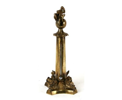 A  Grand tour style 19th century desk top thermometer with dolphin supports, surmounted a Napoleonic soldier, 28cm (11ins) hi