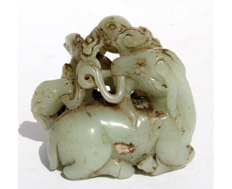 A Chinese jade or green hardstone group depicting deer, 9cms (3.5ins) high; together with a jade twin peach brush washer, 11.