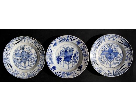 Three Chinese blue &amp; white Kangxi style shallow dishes, 21cms (8.25ins) diameter.