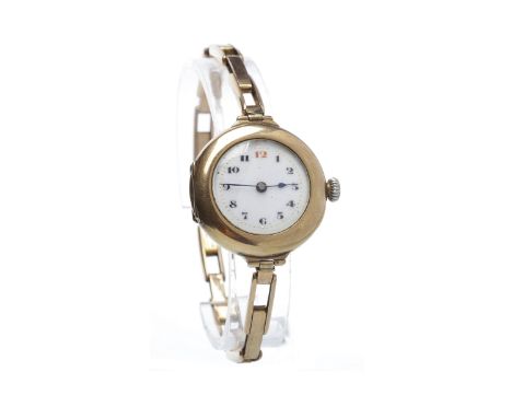 EARLY TWENTIETH CENTURY NINE CARAT GOLD MANUAL WIND WRIST WATCHunsigned movement, the round white dial with Arabic numerals i