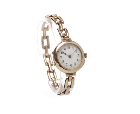 EARLY TWENTIETH CENTURY NINE CARAT GOLD MANUAL WIND WRIST WATCHunsigned movement, the round white dial with Arabic numerals i