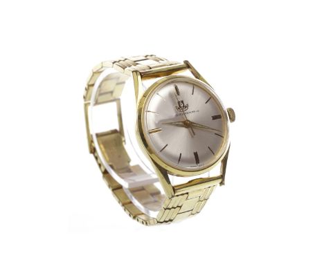 GENTLEMAN'S WATCHES OF SWITZERLAND GOLD PLATED MANUAL WIND WRIST WATCHthe round silver coloured dial with applied gold colour