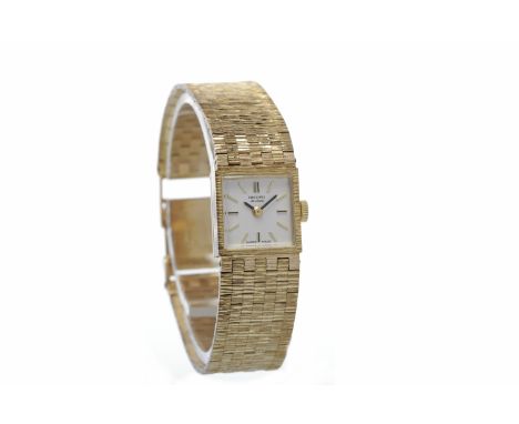 LADY'S RECORD DE LUXE NINE CARAT GOLD MANUAL WIND WRIST WATCHsigned 17 jewel movement, the square white dial with applied gol