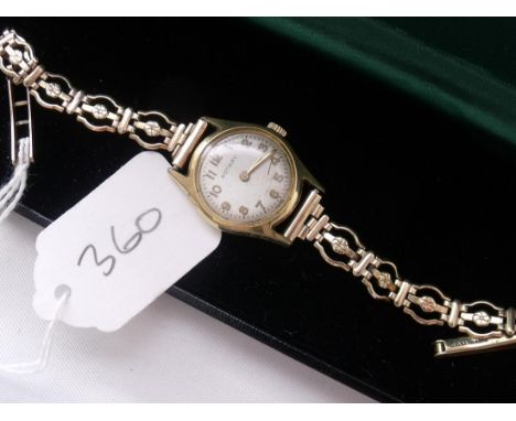 A ladies Rotary wrist watch with silver  dial on 9ct fancy link strap      