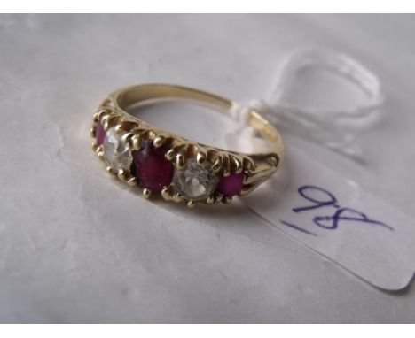 An antique ruby & diamond half hoop  ring set in 18ct gold 'N'      