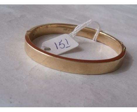 A 15ct gold plain hinged bangle 15.6g    