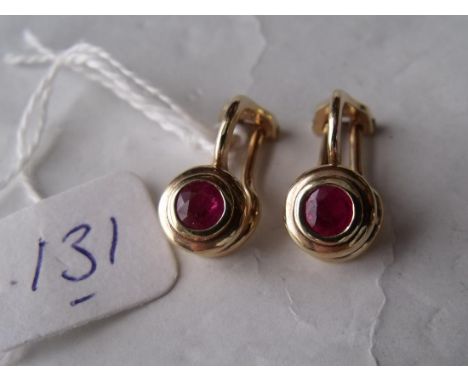A pair of ruby clip on earrings set in  9ct  4.3g        