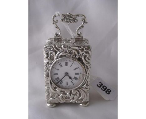 A carriage clock with foliate embossed  case 1.75” wide Birm1903 by HM     