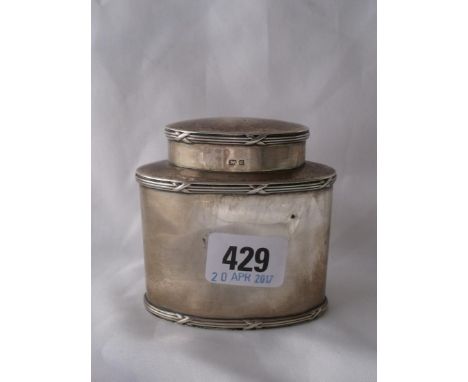 An oval tea caddy with reeded sides 3”  high Birm1903 by DF  110g      