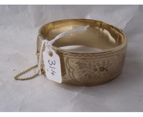 WIDE CHASED DECORATION 9CT HINGED   bangle 47.5g        