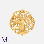 An Art Nouveau Brooch in 18K yellow gold with a bucolic scene depicting a young lady picking