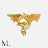 An Antique Opal Chimera Brooch in 18K yellow gold, set with a cabochon opal of good colour. French