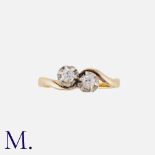 A Diamond Toi et Moi Ring in yellow gold, set with two round cut diamonds weighing approximately 0.