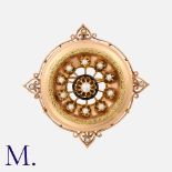 An Antique Pearl And Enamel Brooch in yellow gold, the circular design decorated with a ring of lack