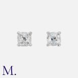 A Pair Of Old Cut Diamond Stud Earrings, in white gold each set with an old cut diamond of