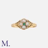 A Victorian Emerald, Pearl And Diamond Ring in yellow gold, comprising a quatrefoil motif of