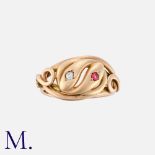 A Spinel And Diamond Snake Ring in yellow gold, designed as two coiled snakes, one head set with a