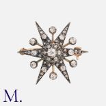 An Antique Diamond Star Brooch in silver and yellow gold set with old cut and rose cut diamonds, the