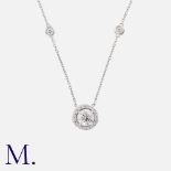 A Diamond Pendant Necklace in 18k white gold, comprising a principal round cut diamond of 1.11cts,