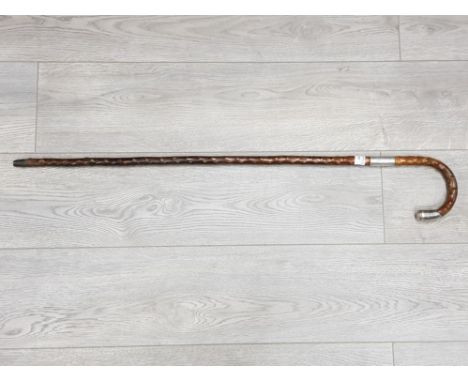 A silver mounted blackthorn walking stick with inscription relating to WWI.