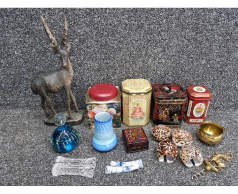 Collectables to include Mdina glass paperweight, Shelly vase, cowrie shell napkin rings, vintage tins, knife rests etc