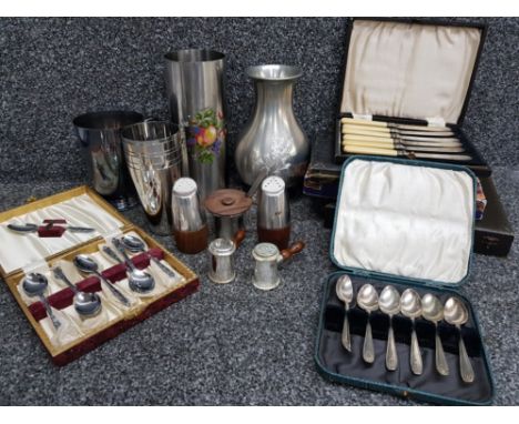 Silver plated flatware, stainless steel salt and peppers, pewter vase etc.