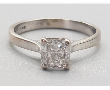 Ladies 18ct white gold solitaire ring, comprising of a radiant cut diamond set in a fair claw setting approximately  .80ct  G