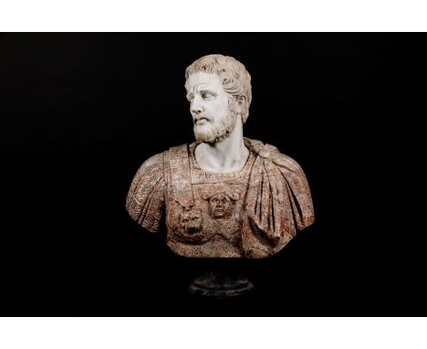 Marble bust of a Roman Emperor with armour and toga. Sculpted with face and lion head in red, white , grey and brown marble w