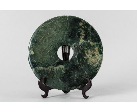 Bi Plate, dark and light green and grey jade, polished; with wax seal. 22Cm diameter.