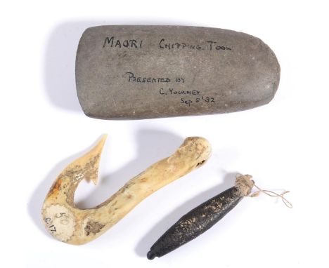 A Maori Axe Head, inscribed, ''Maori Chipping Tool. Presented by C. Yockney Sep 5 '32'', 8.2 cm, 123.8 g; an Interesting Earl