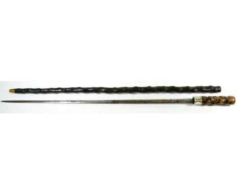 A 19th Century Briar Sword Stick, the 68cm double edge steel blade with central narrow fuller, engraved and gilt with martial