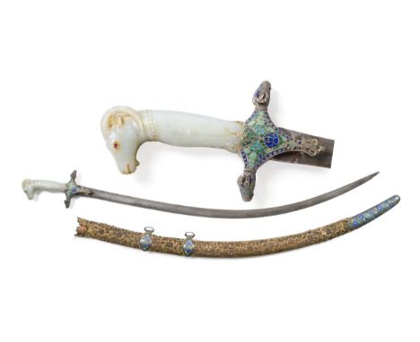 A Good Late 18th Century Indian Shamshir, with 75.5cm single edge curved Wootz blade, the green jade hilt carved with a stiff