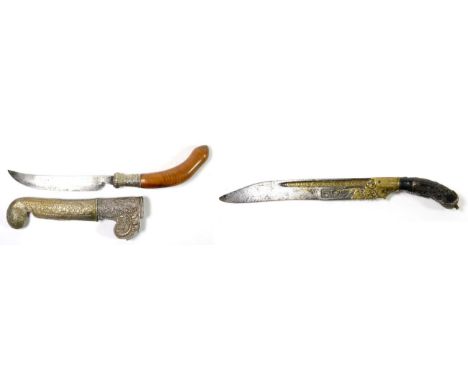 A 19th Century Indonesian Rencong, Sumbawa Island, with 15.5cm single edge curved steel blade, white metal collar and curved 