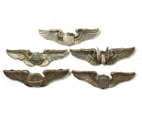 A Collection of Five Second World War USAAF Silver Wings, to a Pilot by Amcraft, Attleboro, Mass.; Navigator by A.E.Co., Utic