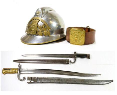 A French Fireman's Adrian Helmet, with chromed finish and brass bound brim, the brass helmet plate embossed SAPEURS POMPIERS 