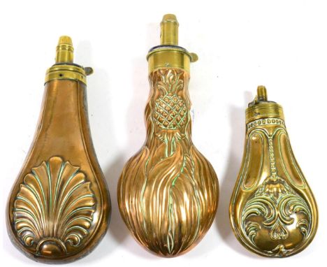 A William Bartram, ''Nimrod'', Copper and Brass Shot Flask, embossed with a thistle design; and two others, one by Dixon & So