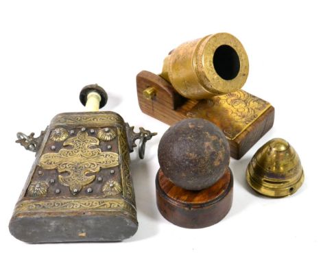 A Small Quantity of Militaria, comprising a Moroccan wood powder flask with foliate strapwork engraved brass mounts; an iron 