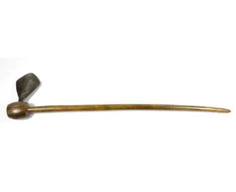 A 19th Century African Rhinoceros Horn Axe, the slender slightly curved and tapering haft, with hand forged steel diamond sha