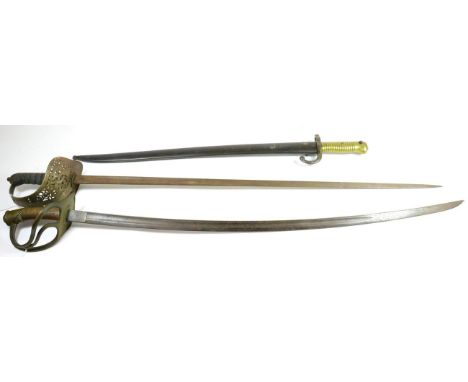 A German Cavalry Sword, the brass triple bar hilt stamped, ''HANCOURT-SOMME 1917'' to the hilt shell and ''GEN. KDO. 14'' to 
