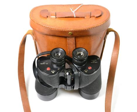 A Pair of Second World War Canadian Binoculars, the black-enamelled frame stamped broad arrow marks, further stamped ''CG.B 4
