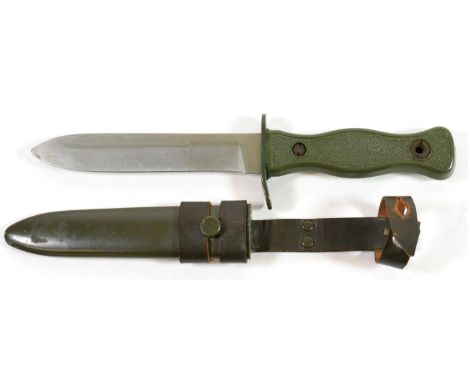 A German Bundeswehr Fighting Knife, circa 1970's, with 14cm single edge steel blade by Whitby, Italy, green painted curved  c