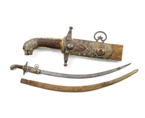 An 18th Century Indo-Persian Shamshir, with 80cm single edge curved steel blade, the Turkish style gilt copper hilt with lion