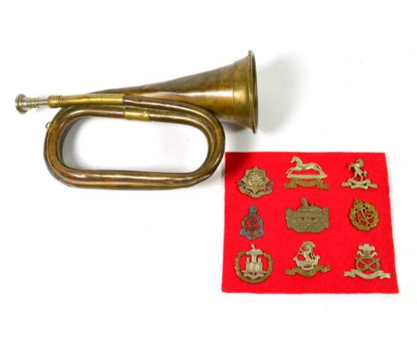 A Collection of Nine Second World War Cap Badges, to East Yorkshire, West Yorkshire, Royal West Kent, Gloucestershire, Dorset