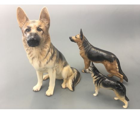 Three Alsatian figurines, one Beswick, one Goebel and one Ulrica of Brittas.