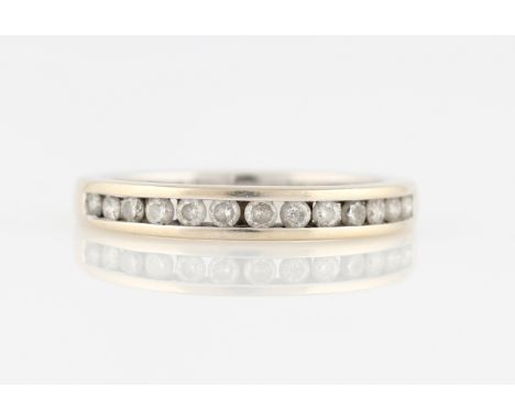 A hallmarked 18ct white gold diamond half eternity ring, set with thirteen round brilliant cut diamonds, total diamond weight