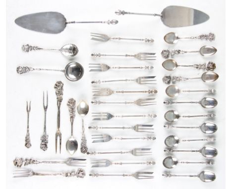 A collection of Continental flatware, to include a set of acorn finial design, comprising twelve pastry forks, two cake slice