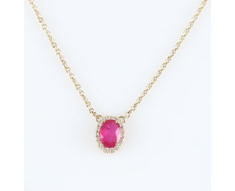 *A ruby and diamond cluster necklet, set with an oval cut ruby surrounded by a border of diamond accents, on belcher link cha