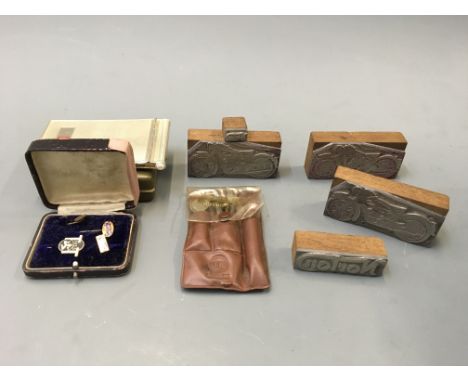 Five Norton motorcycle stamps with badges, tools and BSA notepads and cuff links.