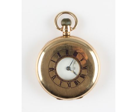 A 9ct yellow gold cased DF&amp;C crown wind half hunter pocket watch, the white enamel dial having hourly Roman numeral marke